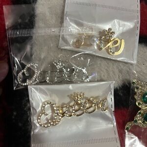 Gold or Silver Queen brooch each